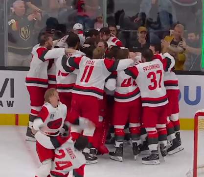 Carolina Hurricanes team celebrating the win