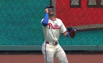 Phillies Rincones Jr. Puts on Sunglasses During Catch